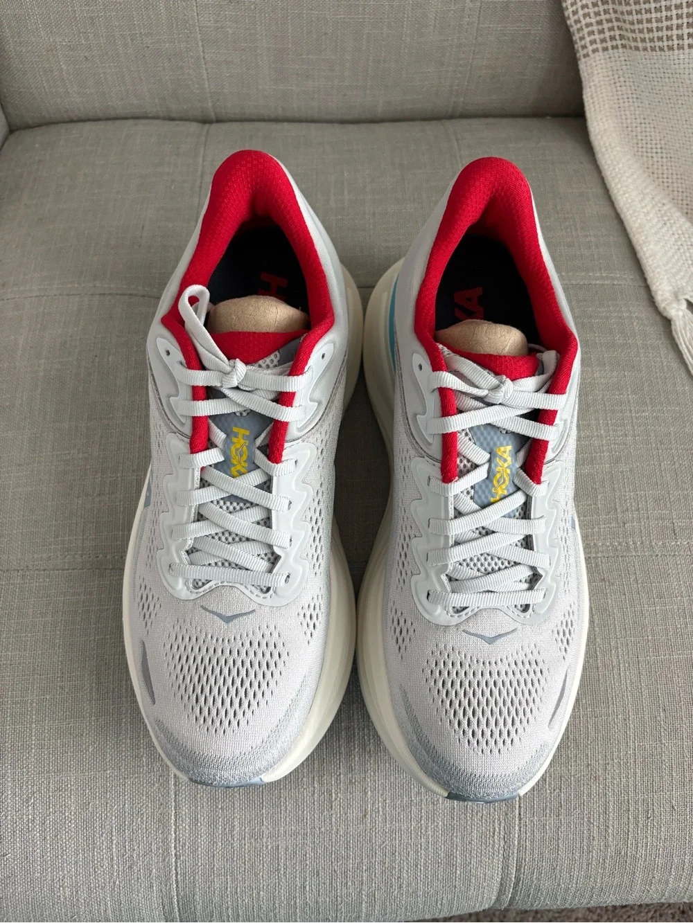 Hoka Women's Bondi 9 Light Gray Running Shoes with Red and Light Blue Accents